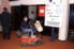 Ragazzo in carrozzina elettrica che visita Handimatica 2002
